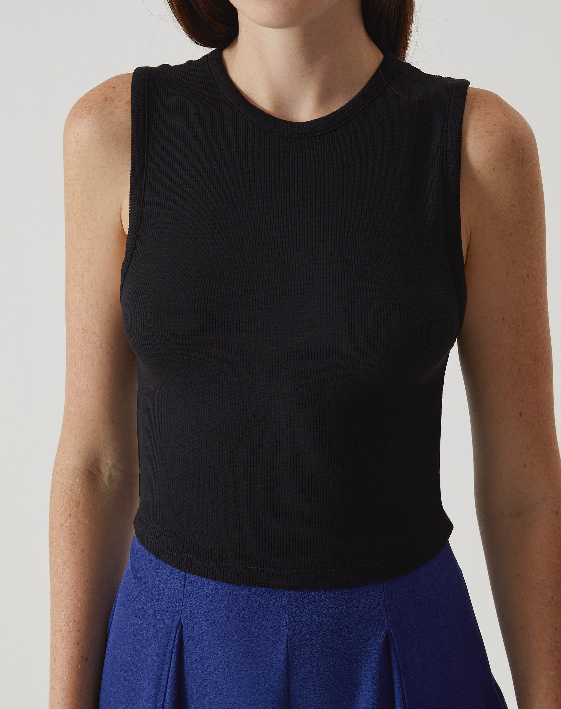 REGATA CURTA DE MALHA - PRETO